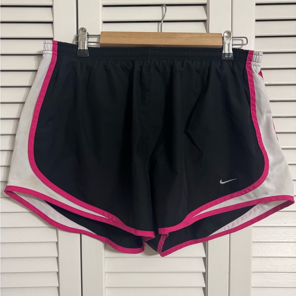 Pink and black Nike running shorts